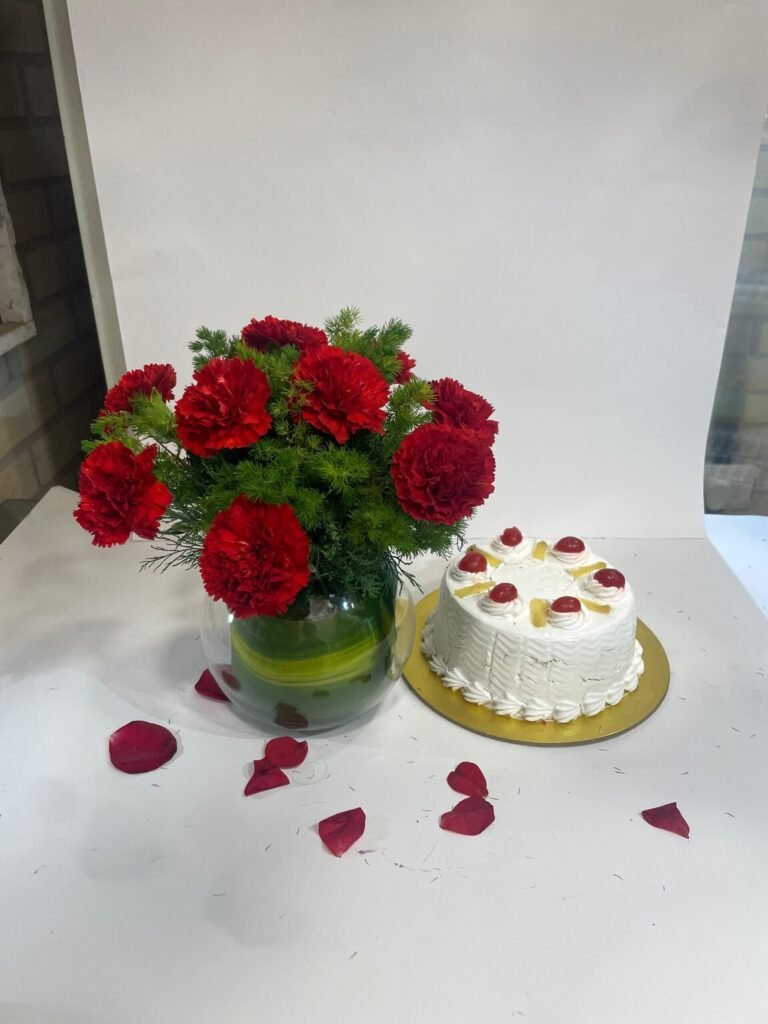 10 Red Carnations in Fish Bowl with Pineapple Cake