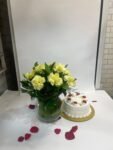 10 Yellow Carnations in Fish Bowl with Pineapple Cake