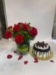 10 Red Carnations in Fish Bowl with Black Forest Cake