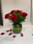 10 Red Carnations in Fish Bowl