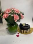 10 Pink Carnations in Fish Bowl with Chocolate Cake