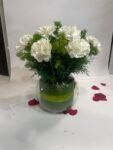10 White Carnations in Fish Bowl