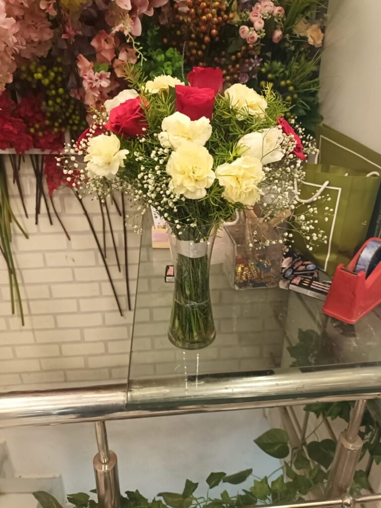 Roses and Carnations in Vase