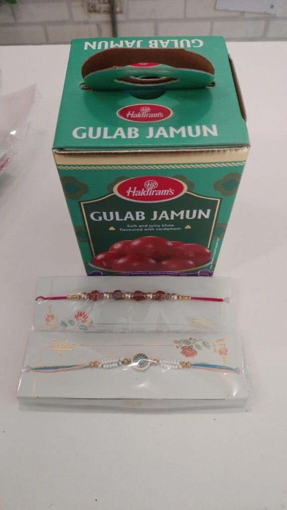 2 Rakhi and Haldiram's Gulab Jamun Box